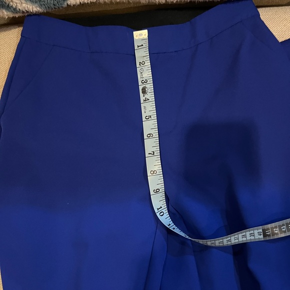 This is a blue suit comes with blazer and pants. It is an XS. - Picture 8 of 10